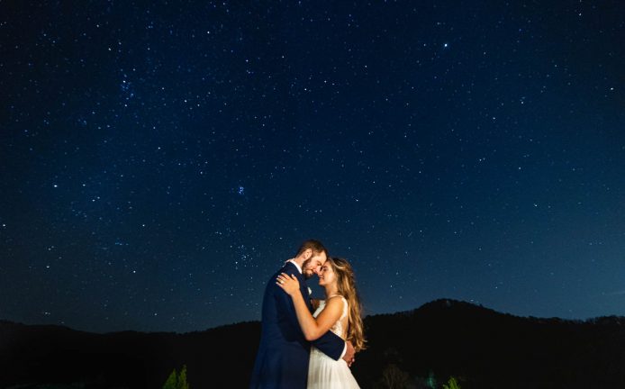 Under the stars, bride and groom photo