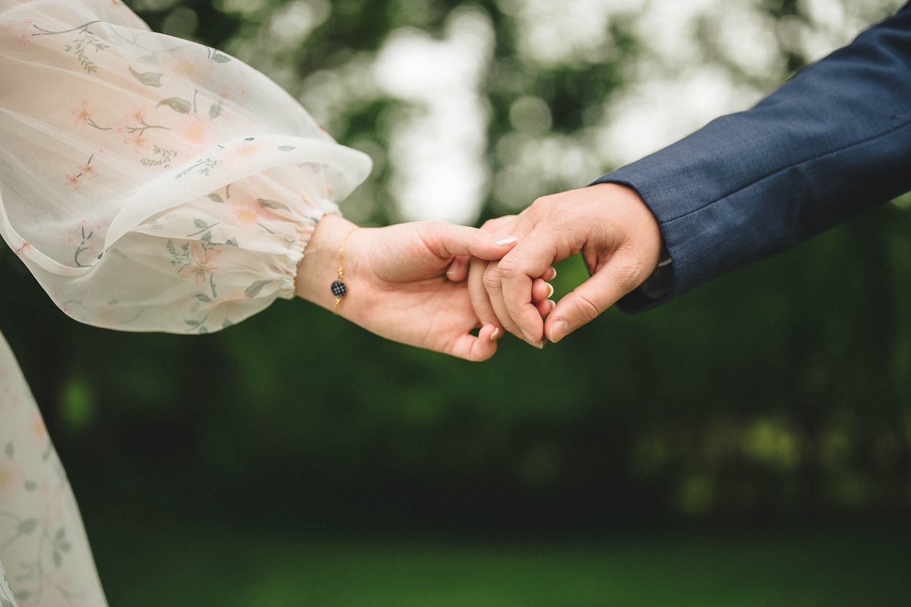 bride and groom's hands